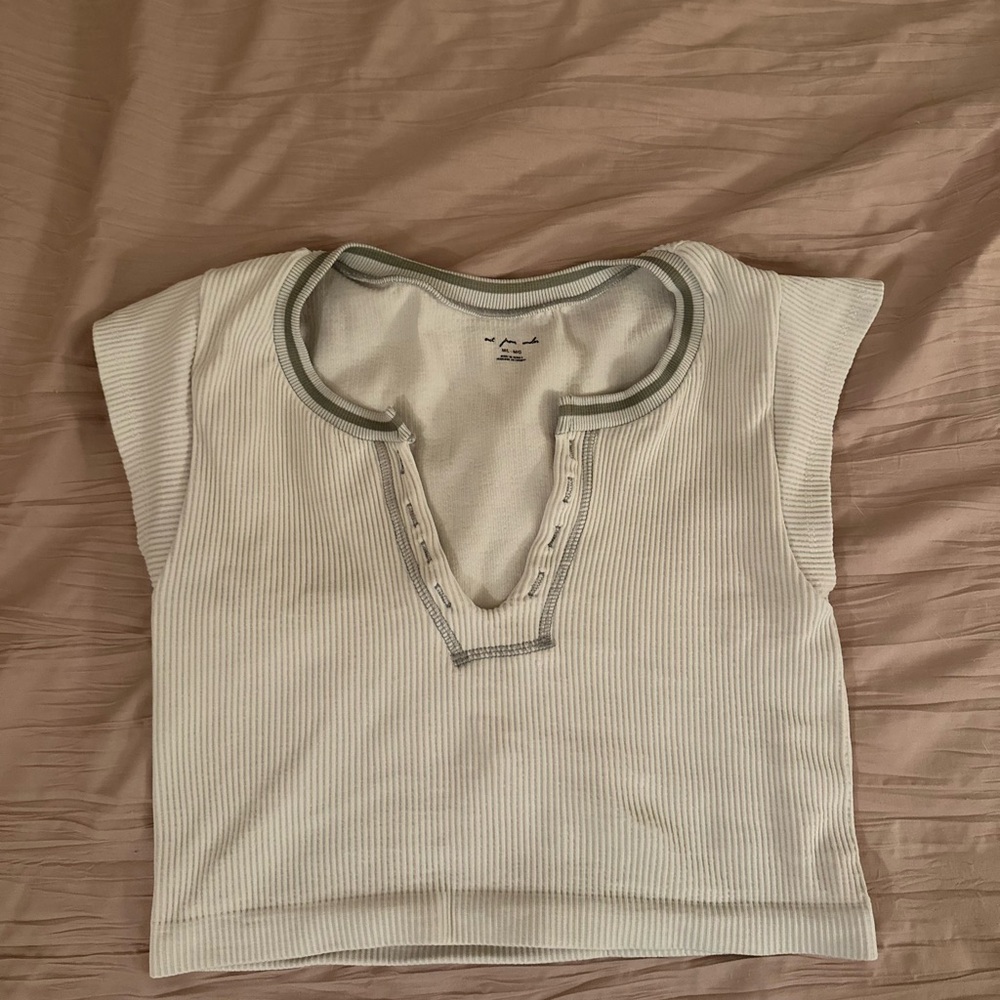 Urban Outfitters “Out from Under” 
White Sleeveless Polo Crop Top